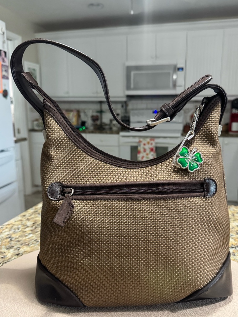 The Sak Brown nylon satchel style purse with leather bottom and strap
